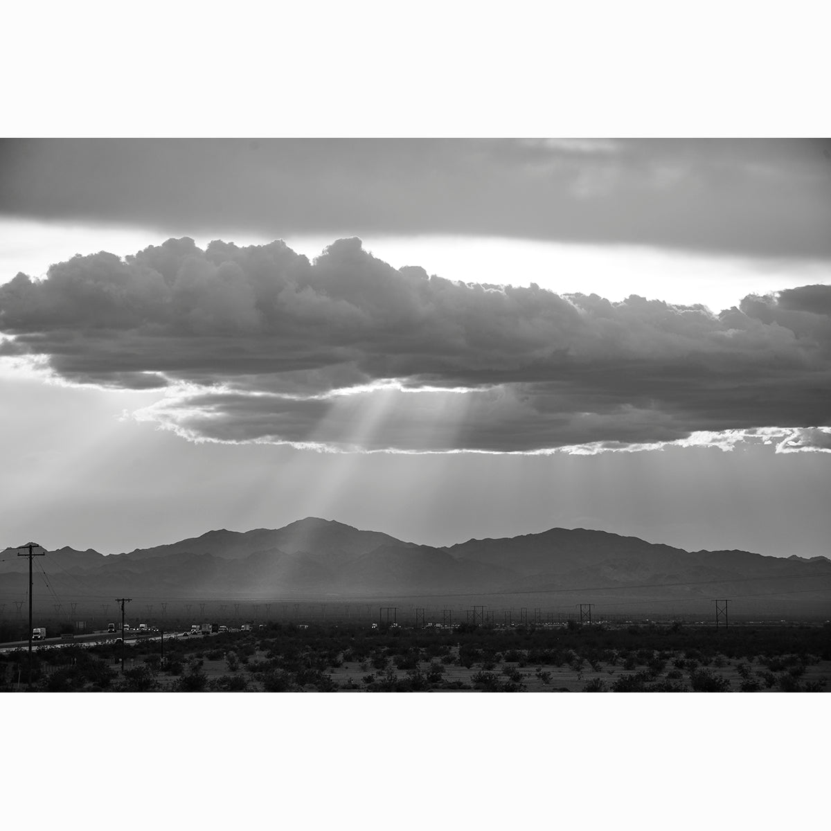 WESTWARD GLOW OVER ASPHALT